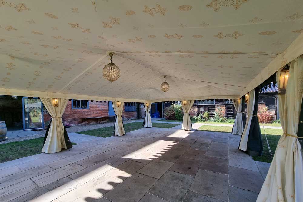 A 9x6m Awning with Jasmine Linings.