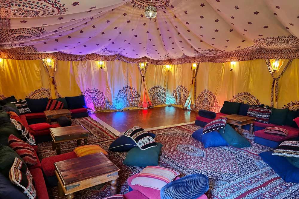 Saffron lining in 6x9m marquee with rgb uplights and dancefloor