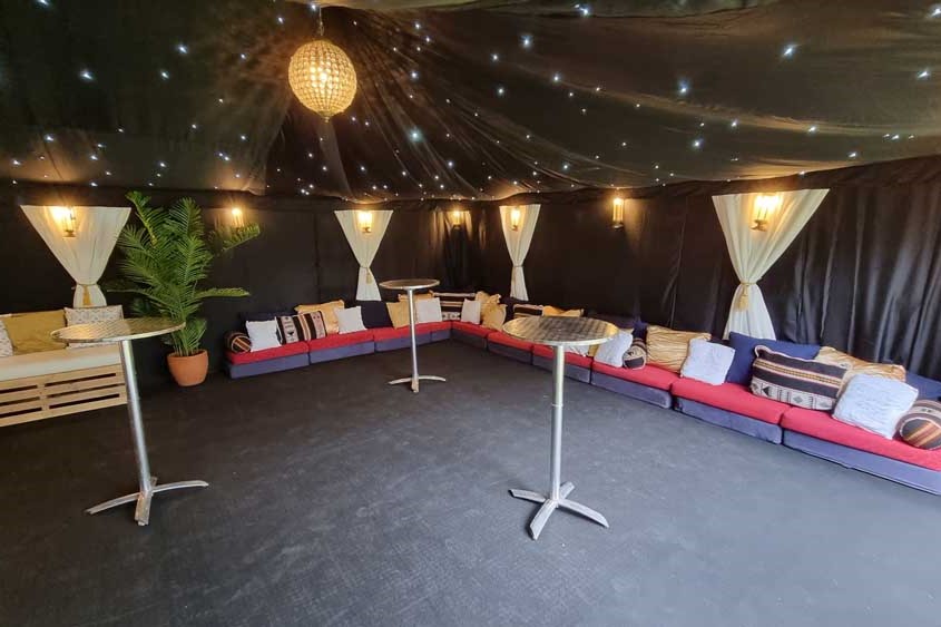 Starcloth Lined 9x6m Tent with Chrome Poseur Tables and Chillout Seating.
